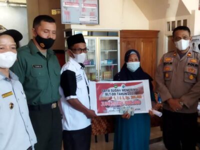 Pemdes Mela'o Salurkan BLT-DD Tahun 2022 Sekaligus Vaksinasi Covid-19