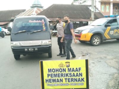 Polisi Jaga Perbatasan Kabupaten Antisipasi Penyebaran PMK